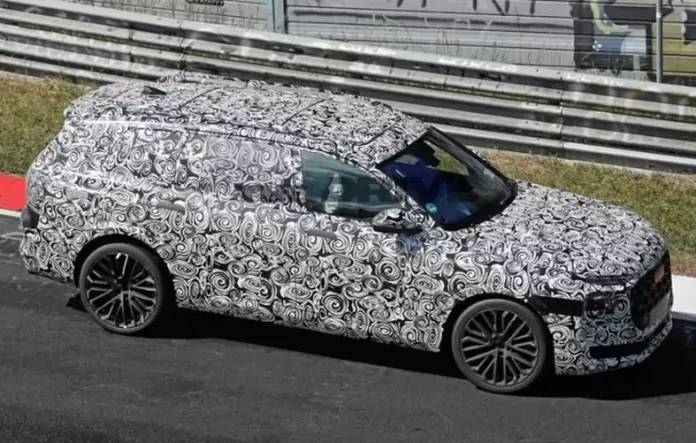 Audi Q9 flagship SUV test model with sleek design, large grille, and three-row layout replacing Audi A8 luxury sedan