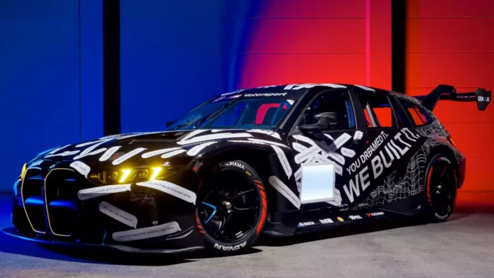 BMW M3 Touring 24H race car with black livery, carbon-fibre aero parts, and racing wheels, revealed ahead of Nürburgring 2026 debut.