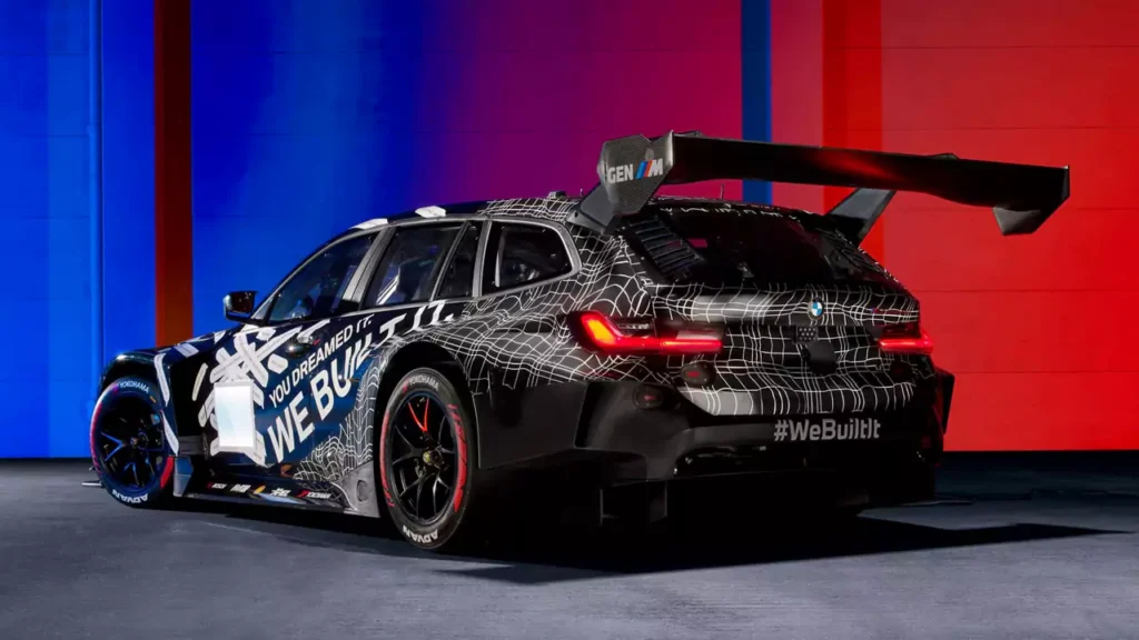 BMW M3 Touring 24H race car with black livery, carbon-fibre aero parts, and racing wheels, revealed ahead of Nürburgring 2026 debut. BMW M3 Touring 24H race car with black livery, carbon-fibre aero parts, and racing wheels, revealed ahead of Nürburgring 2026 debut.